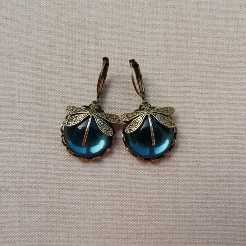Sphärische Libellenohrringe in Antikgold